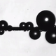 Illustration for article titled Pent-Up Energy Causes Drops to Hurl Themselves Off a Teflon-Covered Thread